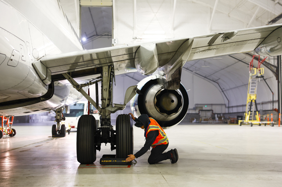 He used to load planes; now he fixes them