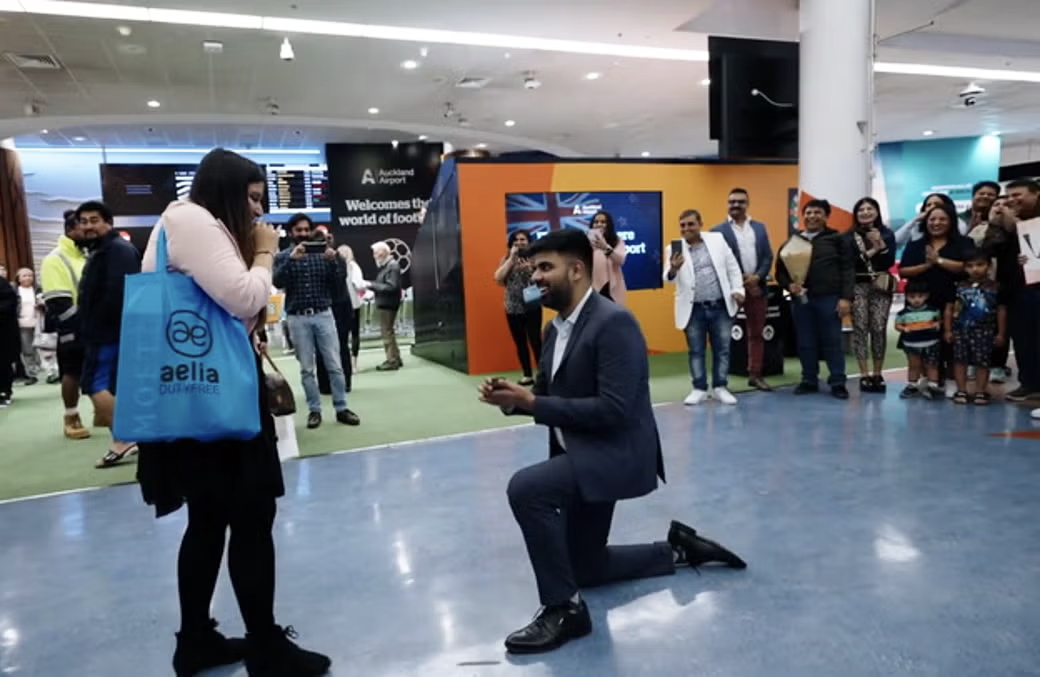 Man proposes to girlfriend over the PA system at Auckland Airport (she said yes)